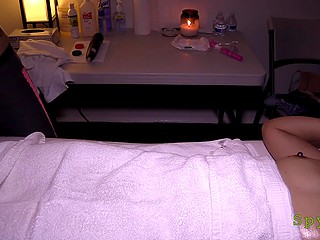 Perverted masseuse doesn't mind pleasing client with a nice fisting captured on her hidden camera 2