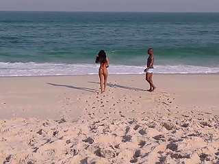 Brazilian hottie in red bikini notices the crusher on the beach and wishes to suck his cock 3