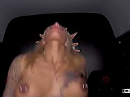 Tattooed blonde with a nose and nipple piercing practices sex in the German Bums Bus 9