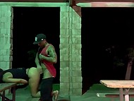 Black guy in a cap fucks a hooker's pussy from behind outdoors and hidden camera films it 5