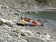 On the Bulgarian beach, tourist finds naked chick and convinces her to give him a quick blowjob 4