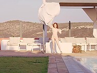 Young girl with red hair enjoys outdoor dancing and attracting attention to her small tits and gentle pussy 9