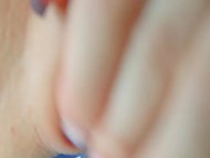 Beautiful brunette with blue eyes gives shaved pussy pleasure using red and blue dildos 10