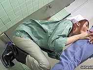 Japanese pervert whips out boner in the toilet and busty janitor happily takes care of it 5