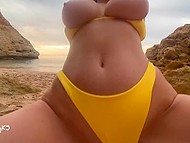 Beach is a beautiful place for the blonde in a yellow swimsuit to be fucked in the vagina 11