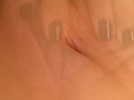 Lovely brunette Leda displays her assets before starting to finger own sweet snatch 11