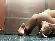 Guy with nipple piercing is so horny that he starts jerking his dick in the elevator 5