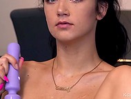 Brunette easily entertains wet peach with big purple Hitachi vibrator on the blue couch 7