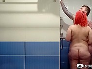Girl with bright red hair gives a blowjob to guy in the shower and receives facial cumshot 7