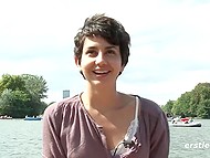 Short-haired amateur cutie sticks fingers into her natural bush and gets off by the lake 10