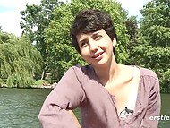 Short-haired amateur cutie sticks fingers into her natural bush and gets off by the lake 8