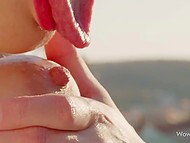 Dark-haired bombshell takes off her sexy swimsuit and enjoys masturbation touching her big boobs 9