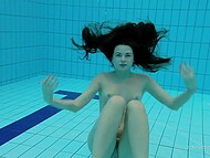 Young dark-haired babe Katy swims in the pool demonstrating her small tits and gorgeous ass 7