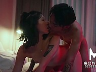 Excited Asian guy and his slender girlfriend passionately make love in the darkened bedroom 11