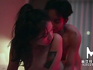 Excited Asian guy and his slender girlfriend passionately make love in the darkened bedroom 5