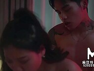 Excited Asian guy and his slender girlfriend passionately make love in the darkened bedroom 6
