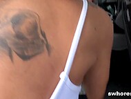 Busty street whore with sexy tattoos skillfully takes the guy's dick into mouth and cunt by the car 4