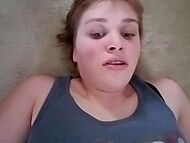 Sexy girl in tank top is fucked by man on the floor on camera close-up first person 10