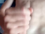 Man relaxes and fucks hand in his self-made amateur solo video in the bedroom close-up 11