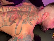 Young gay stuck fist up to elbow into luxurious tattooed boy's anus in the doggystyle pose 5