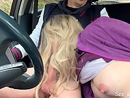 Experienced blonde prostitute gives blowjob in the car with nude breasts for some cash 9