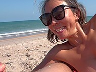 Babe with round tits was sunbathing on the beach and decided to caress her man's dick with hands 11