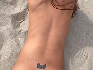 Slender babe poses on the deserted beach and gives blowjob to her cameraman 5