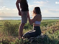 Slender babe gets on the knees to suck lover's dick and exposes her ass in the open air 4