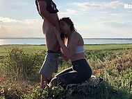 Slender babe gets on the knees to suck lover's dick and exposes her ass in the open air 7