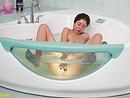 Russian brunette with small tits relaxes in the bathroom using favorite dildo for a gentle masturbation 6