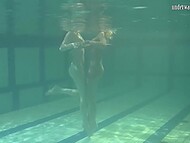 Young girls enjoy swimming in the pool and demonstrate gentle pussies and natural tits 4