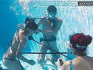 Slim brunette pleases her man with underwater blowjob and takes his dong into her cunt in the pool 6