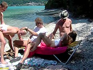 Several dudes and filthy sluts came to the beach and held unforgettable gangbang for the camera 6