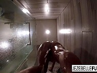 While dark-haired MILF with tattoos relaxes in the bathroom hidden cam records her sexy actions 6