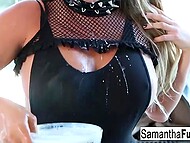 Naughty blonde MILF in the image of a sexy kitty laps up milk and pours it on her big tits 8