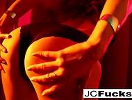 Gorgeous woman with beautiful tits pours milk on her body and seductively poses in black stockings 9
