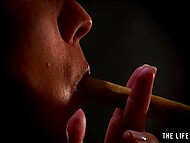 Sultry naked brunette with perfect tits sticks a cigar into her hairy twat and gets off in the dark room 6