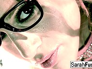 Vivid redhead with glasses Sarah Jessie strikes sexy positions and pleases herself with a vibrator 4
