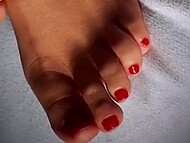 Skillful amateur chick exposes her sexy feet and jerks her lover’s cock off with them till the man cums 5