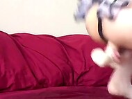 Asian MILF in fishnet stockings spreads her legs and masturbates, pointing dildo in pussy 6