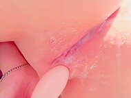 Shy girl gets horny and films amateur masturbation in close-up, showing shaved vagina and her favorite toy 10