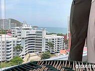 Amateur Latina lesbian rubs her horny girlfriend’s pussy and makes her cum right on the balcony 6