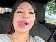 After giving a blowjob in the car, naughty brunette gets cum on her face and shows it to other people