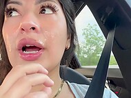 After giving a blowjob in the car, naughty brunette gets cum on her face and shows it to other people 8