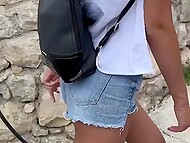Flirty tourist in sexy shorts shows her small tits and enjoys public fucking with a horny friend 5