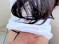 Brown-eyed Asian wench gets on the knees to blow her lover and copulates with him on the balcony 9