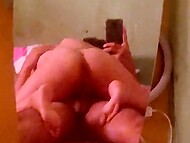 A guy makes an amateur video of his naked slender girlfriend riding his dick in cowgirl style on the bed 8