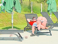 Busty Russian blonde in bikini fucks with a guy by the pool and opens her mouth to get cumshot 8