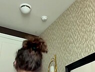Amateur hottie installs a camera and teases with her huge naturals when masturbating on the bed 9