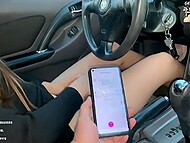 Russian cutie Valeria Sladkih drives a car while she has a pink masturbation toy in her pussy 11